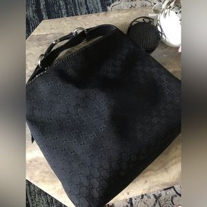 Gucci black monogram hobo style bag